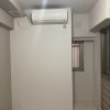 東京都大田区マンション 洋室エアコン配管補修施工後 壁面がすっきり整った補修後